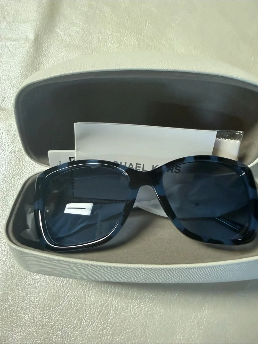 Michael Kors sophisticated cat